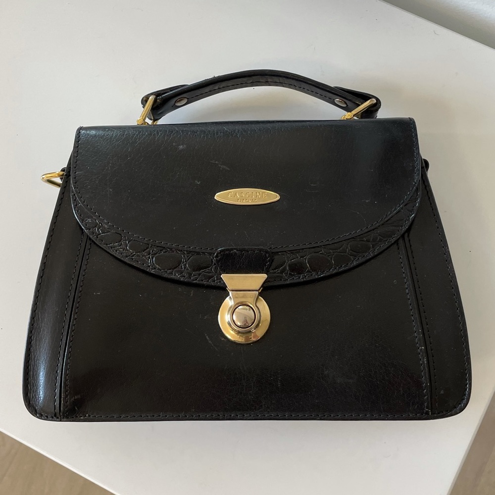 • vintage leather handled bag with gold hardware •